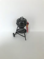 Barbecue voor het poppenhuis