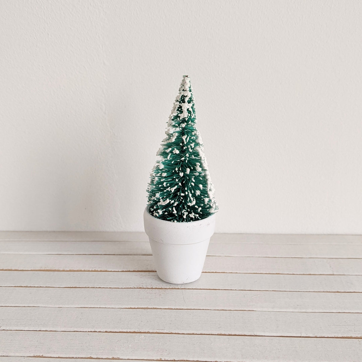 Kerstboompje met sneeuw