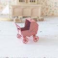 Miniatuur poppenwagen