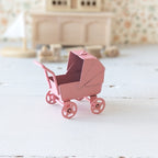 Miniatuur poppenwagen