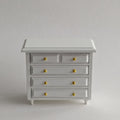 Miniatuur witte ladekast