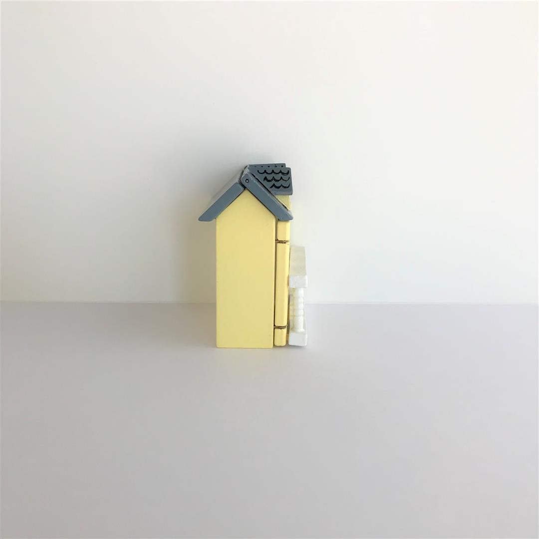 Poppenhuis voor het poppenhuis geel