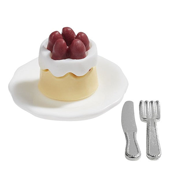 Miniatuur taartje op bord