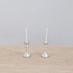 Zilveren kandelaars met kaarsje